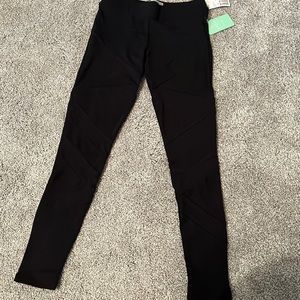 NWT black crisscross sheer net leggings